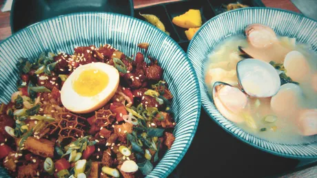 Two bowls of food, halftoned in red and teal.
